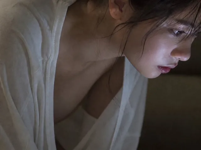 Moody Woman Looking at Phone preview image 1