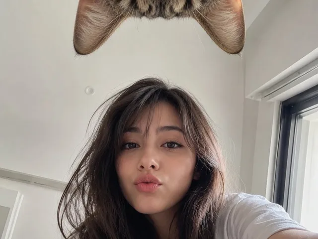 Identity Reference Selfie with Cat preview image 1